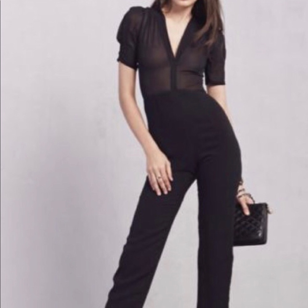 Reformation jumpsuit size S in black.